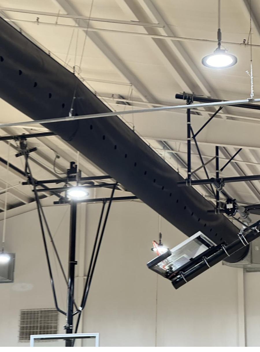 Overhead commercial equipment and duct runs in a retail build-out