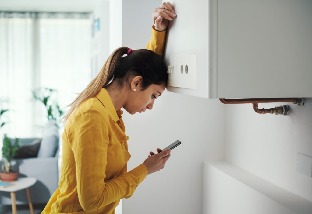 Woman calling a boiler breakdown service